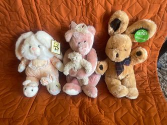 Two Gund stuffed animals and one unnamed