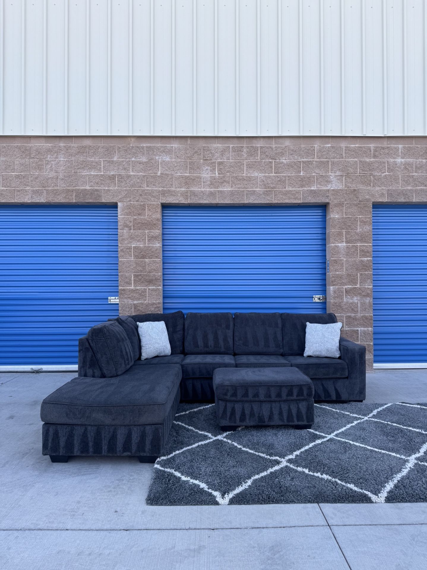 Ashley’s Dark Grey Sectional Couch With Ottoman