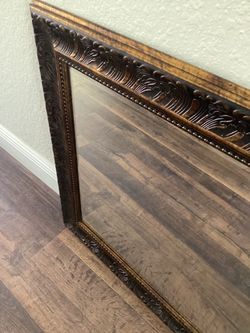 Black and gold mirror