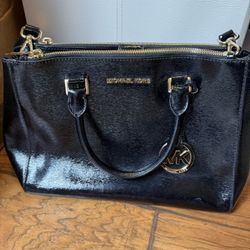 Selling this Original Michael Kors Purse  Flaws is only very tiny as seen in the last picture  Overall the bag is still in good condition