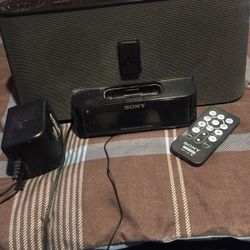 Black Sony docking station w/ remote