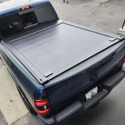 2009- 2025 SyneticUSA Off-Road Pro Hard Aluminum Manual Retractable Roll-up Waterproof Tonneau Cover Dodge Ram 1500, 2500, and 3500 6.5 Feet Truck Bed