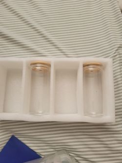 4 Brand New Glass drinking containers.