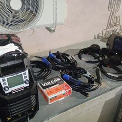 XTRAMIG-200 Multi-process MIG/MAG/MMA/TIG Synergic Welder and Cut-65K Plasma cutter with compressor.