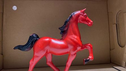 Vintage red horse toy