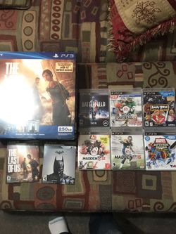 PS3 with remote and eight games