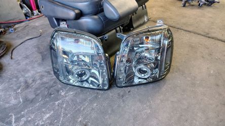 Custom Headlights for 07-13 Yukon and Denali, $80 for the pair.