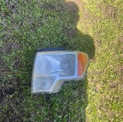 2009-20014 Ford F150 Left Side Headlight 