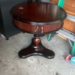 Beautiful Wooden Round Table With Accordion Doors 