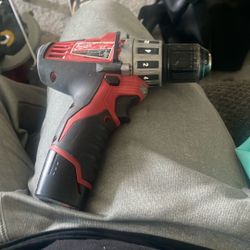 Milwaukee 12 V Hammer Drill With One Battery New Charger Used But Great