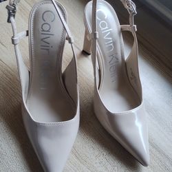 Calvin Klein Women's Amaria Wheeled Heel Shoe
