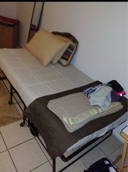 Fold-Away Twin bed frame with mattress
