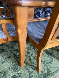 Honey oak dining table & chairs wrought iron inset