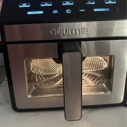 Gourmia 8-Quart Digital Air Fryer, equipped with a viewing window and interior lighting.