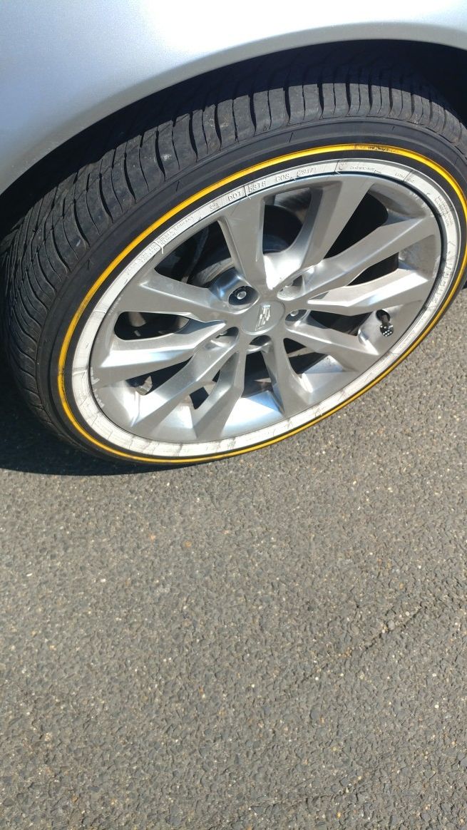 19 inch Cadillac rims with vogues