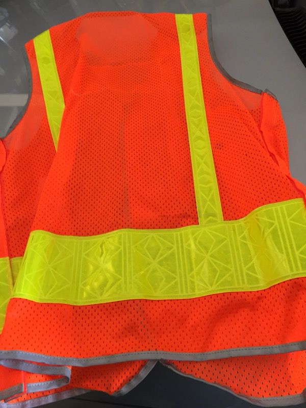 Bright orange and yellow safety vest great for Halloween costume