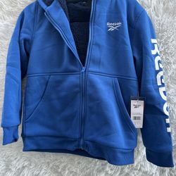 Kid’s Reebok Blue Hoodie Jacket In Size Medium (10/12)