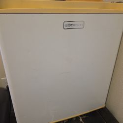 Emerson white fully functional mini fridge with tiny freezer-hotel size