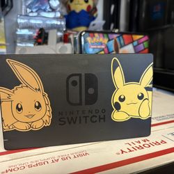 PIKACHU AND EVEE DOCK, TRADE FOR SINGLES, POKEMON OR SPORTS