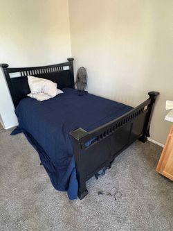 Black wooden bed frame