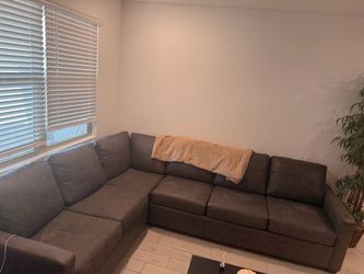 Brown/gray L shaped couch