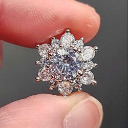 Cubic Zirconia Flower Shaped Sterling Silver Stud Earrings.