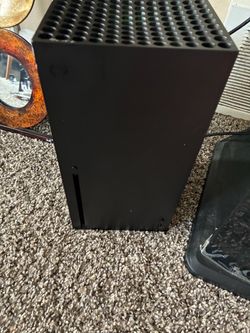Xbox series X with headset and controller