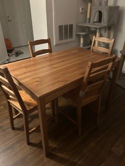 Wood table and four chairs