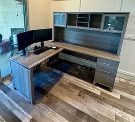 Gray Sit-to-Stand L-shaped Office Desk with hutch and storage