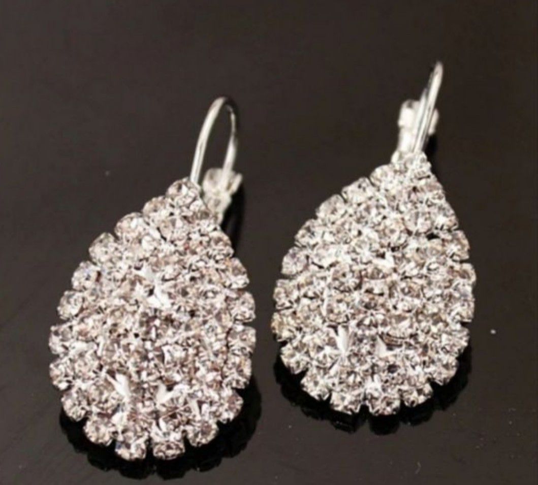 $7 new silver plated CZ earrings