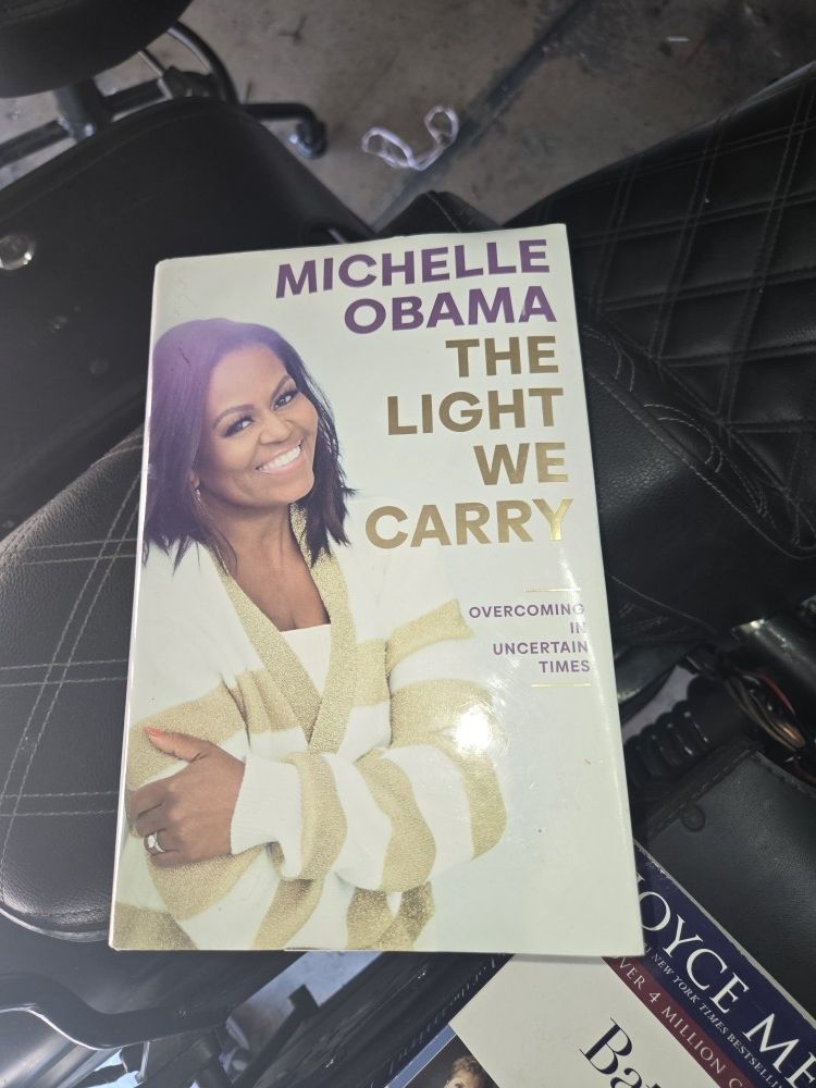 The Light We Carry: Overcoming in Uncertain Times" by Michelle Obama.