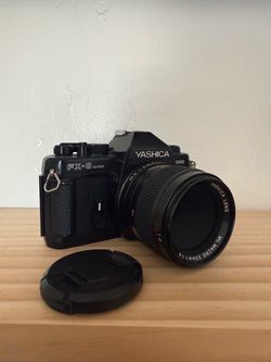 Yashica FX-3 Super 2000 with two lenses.
