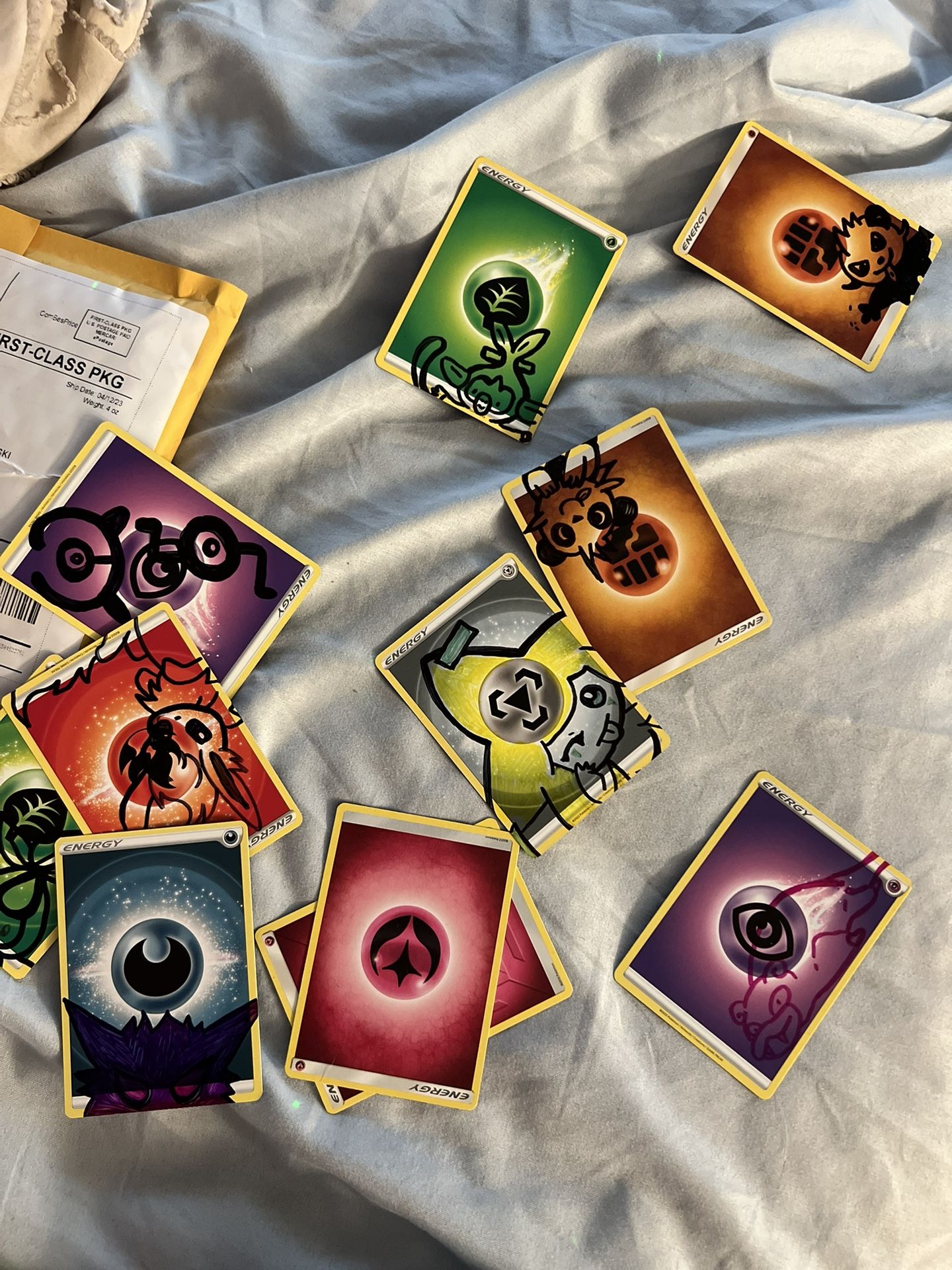 Assorted custom pokémon energy cards