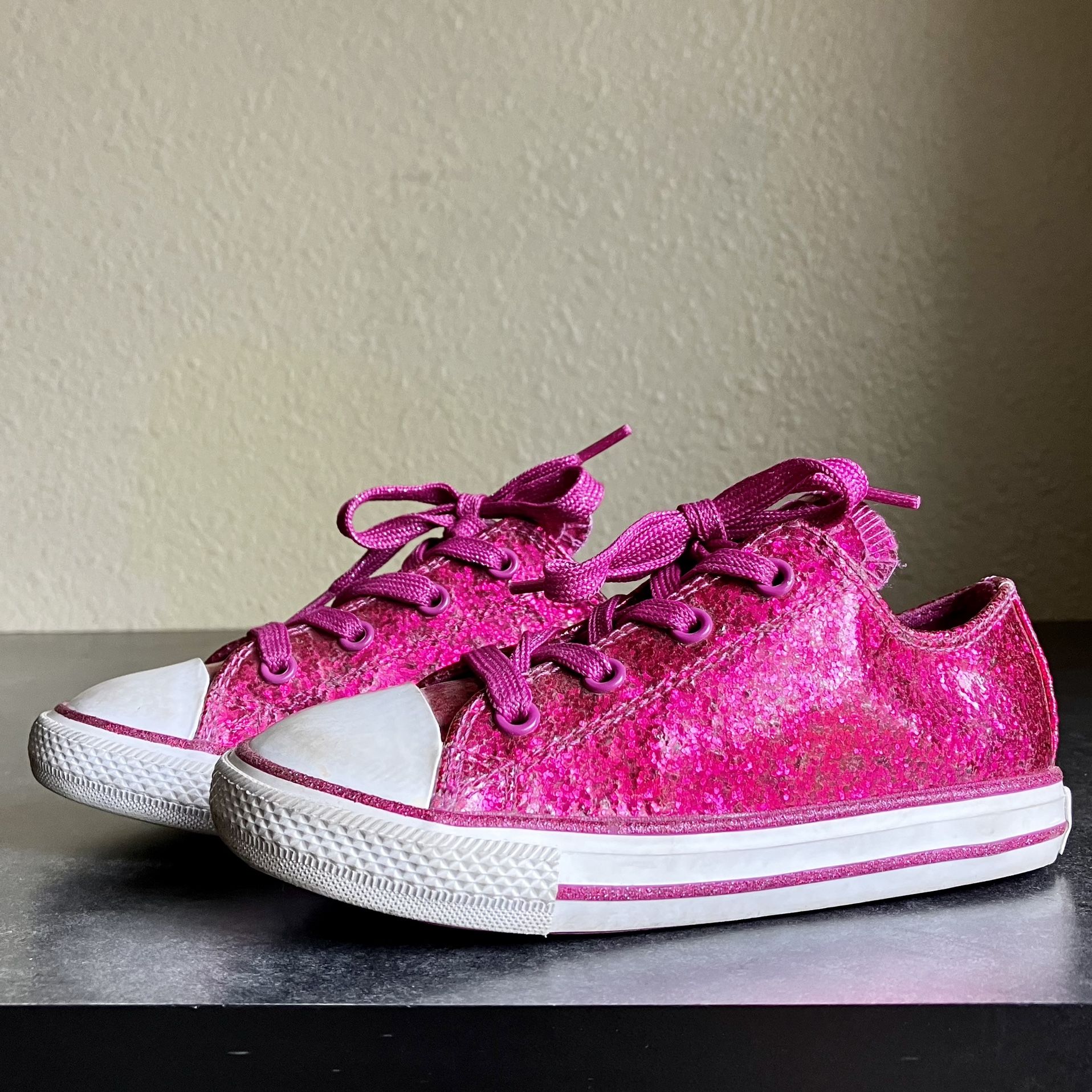 Converse pink glitter shoes