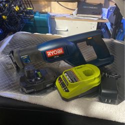 Reciprocating Saw And New Charger And 1.3 Ah Ryobi Battery 