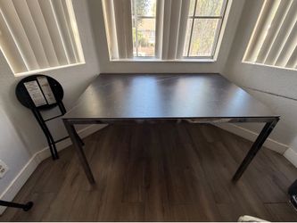 IKEA black metal dining table