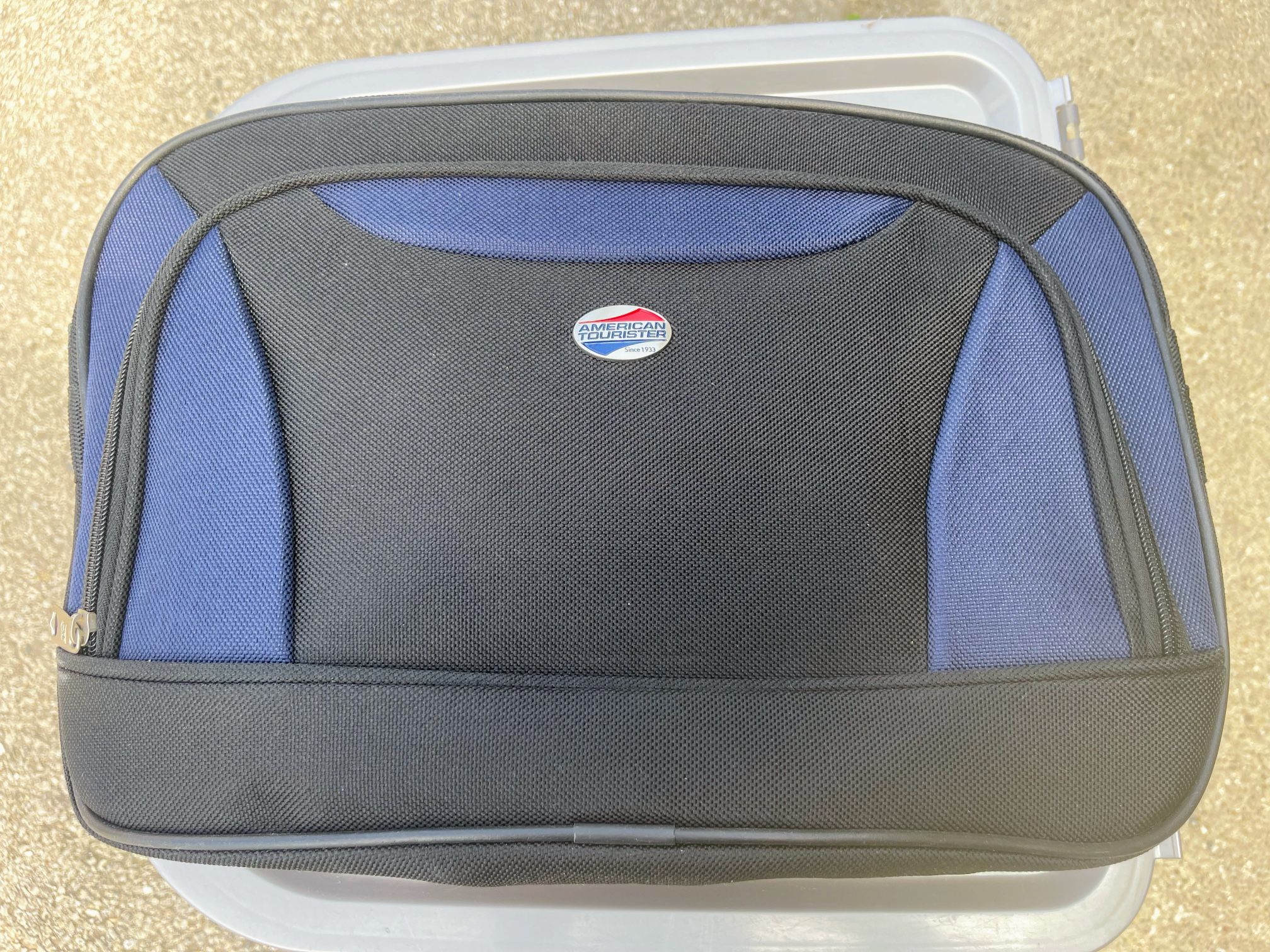 American Tourister carry-on bag