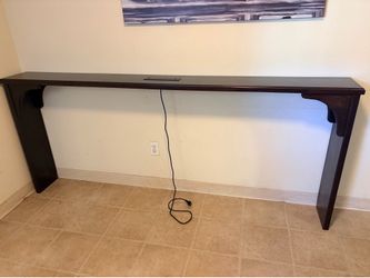 Behind the couch table