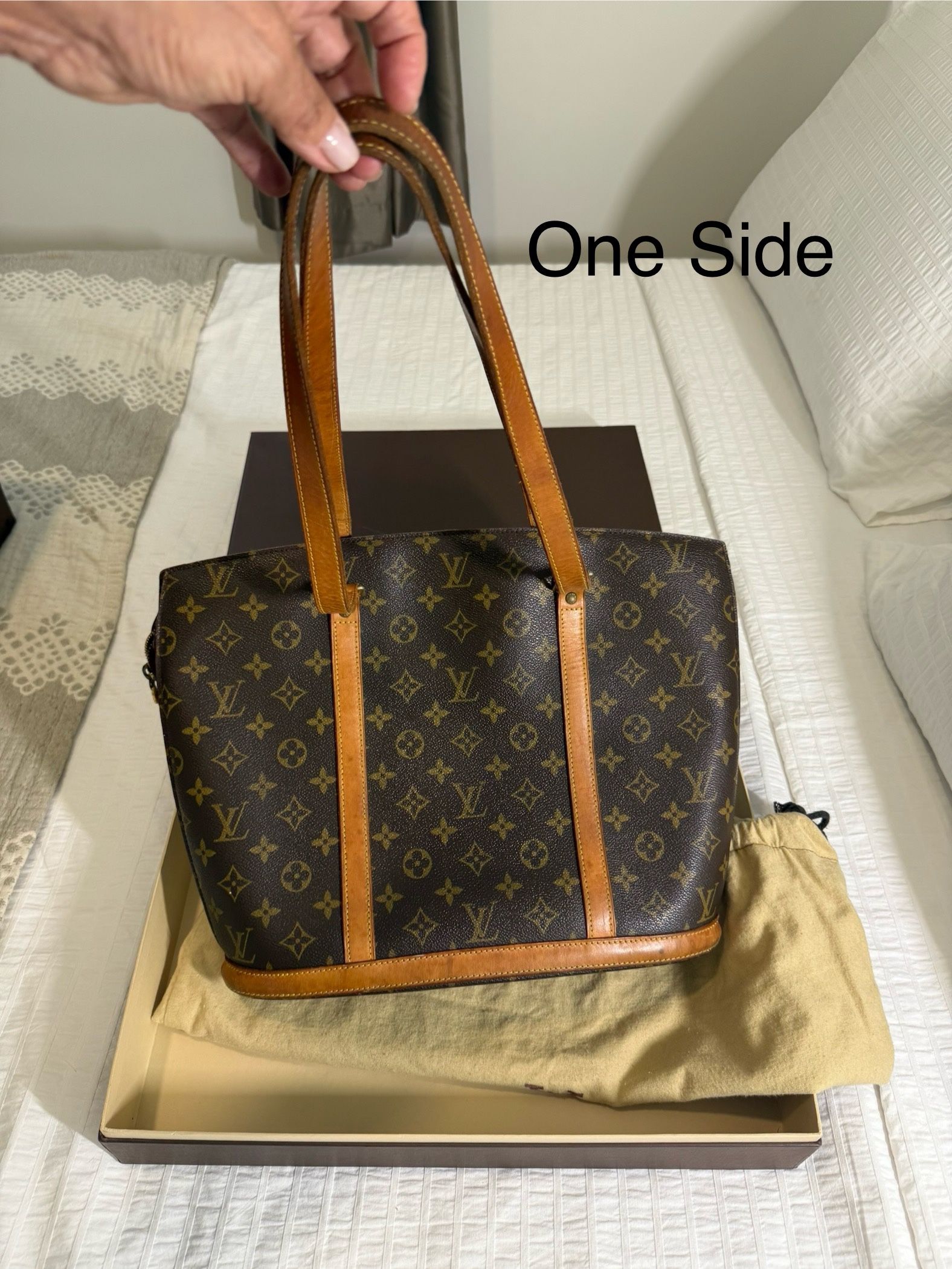 PRICE NEGOTIABLE. Bought in 1998 AUTHENTIC LOUIS VUITTON Babylone Monogram Tote Bag. Mint condition, only flaw is inside with stains as shown in pictu