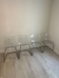4 acrylic chairs
