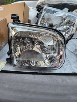 New pair of Toyota headlights. Has clear lenses with chrome interior. Black housing. Includes two headlights.AUTOSAVER88 Headlight Assembly Compatible