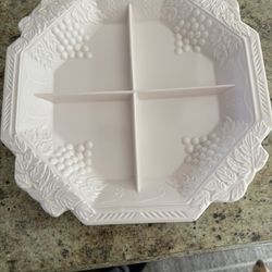 This rare and elegant divided relish dish was produced exclusively in the late 1950s by Jeannette Glass as part of their Shell Pink line, known for it