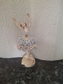 Delicate antique ballerina