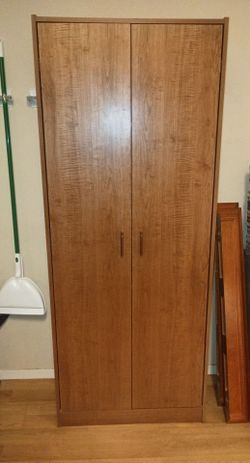 71.5" height x 28.5" x 14.5" depth Tall Pantry/ Storage Cabinet.