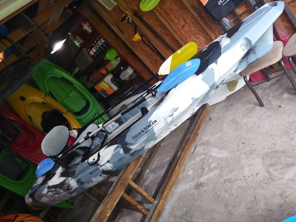Field and stream shadow caster 123 angler fishing kayak