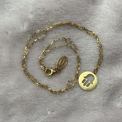 18 K Cartier Symbol Pendant With Cartier Gold Chain