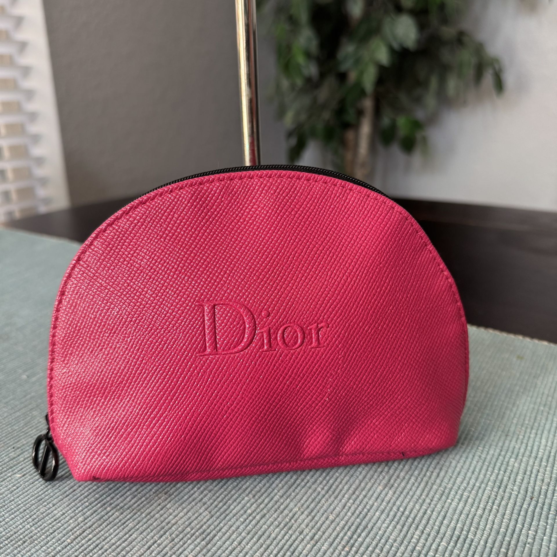 Christian Dior Beauty pink makeup cosmetic bag.