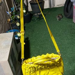 Yellow Prada Nappa Gaufre handbag.