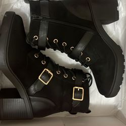 Black Booties With Gold Accessories