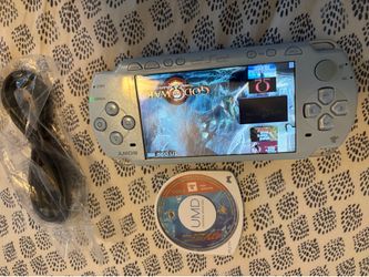 PSP 200 + 100 games (hablo espanol)